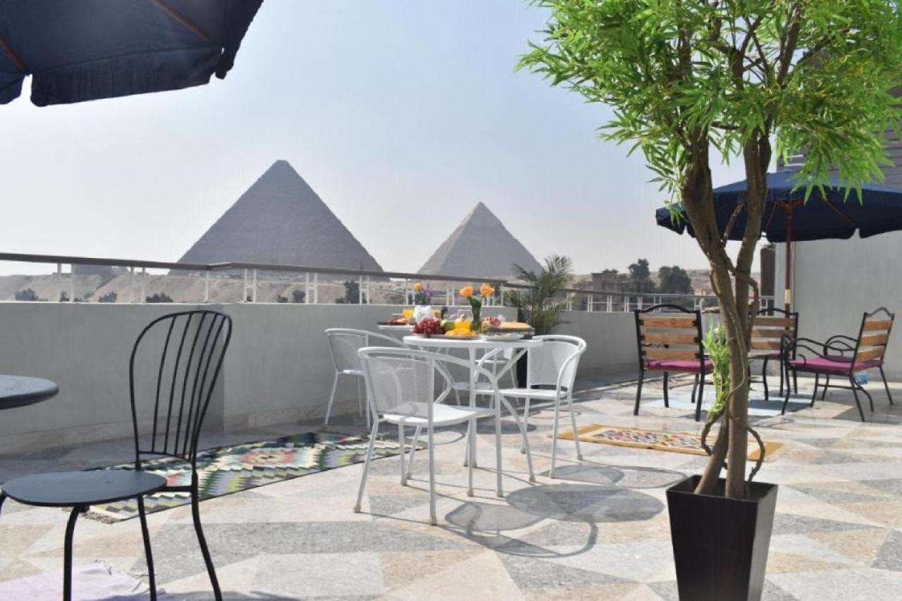 Апартаменты La Perle Pyramids Каир Экстерьер фото